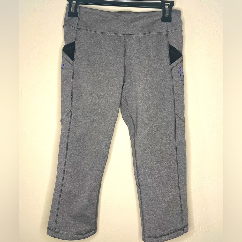 LIKE NEW: Ivivva by Lululemon Crop Leggings with Purple Detailing on Pockets